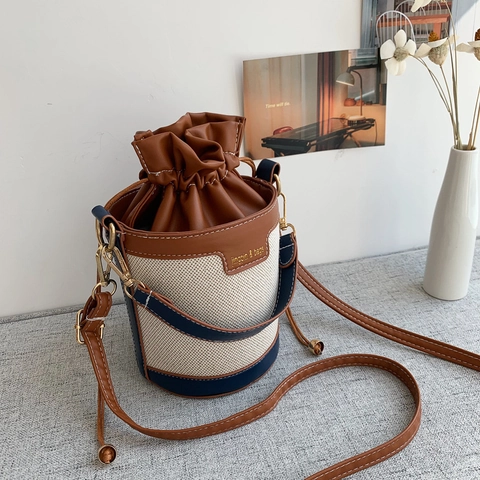 Trendy Retro Bucket Bag voor Dames Koreaanse Stijl Minimalistisch Canvas PU Leer Contrastkleur Trekkoord Schoudertas