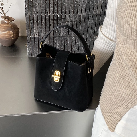 Borsa A Secchiello In Pelle PU Minimalista Da Donna Borsa A Mano Design Di Nicchia Con Tracolla Regolabile E Chiusura Ruotabile Stile Vintage