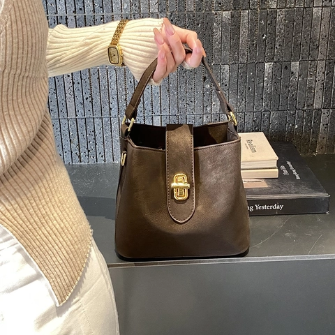 Borsa A Secchiello In Pelle PU Minimalista Da Donna Borsa A Mano Design Di Nicchia Con Tracolla Regolabile E Chiusura Ruotabile Stile Vintage