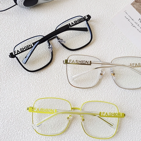 Occhiali Di Moda Quadrati A Montatura Grande Anti Luce Blu Resina Metallo Lente Chiara Montatura Ottica Design Lettera Cava