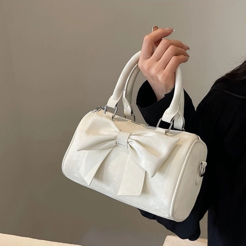 Sac Bandoulière Cylindre Femme Cuir PU Décor Grand Nœud Sac À Main Doux Chic Boston Bag Poignée Bandoulière Amovible
