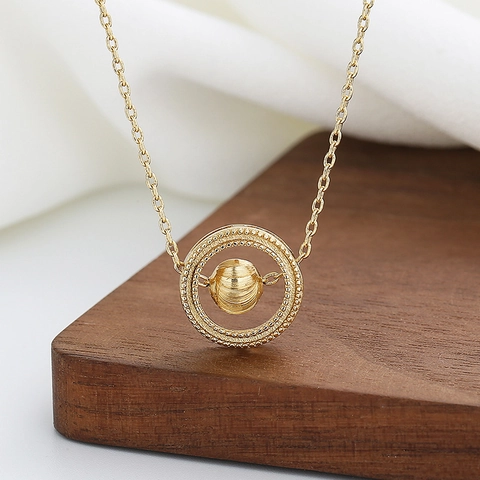 Collier Pendentif En Cuivre Géométrique Avec Perle Ronde Rotative Style Planète Céleste Chaîne De Clavicule Pour Femmes