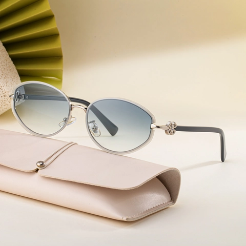 Damen Oval Cat Eye Sonnenbrille Metallrahmen PC Gläser UV400 Schutz Kleeblatt Blume Dekoration Outdoor Mode