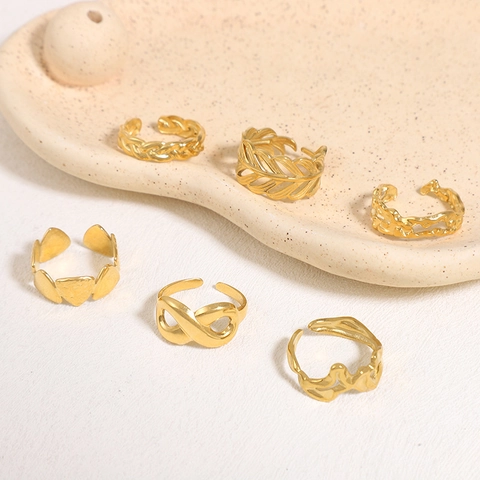 Anello Aperto Regolabile Dorato Acciaio Inossidabile Texture Irregolare Infinito Foglia Design Geometrico Accessorio Moda Minimalista