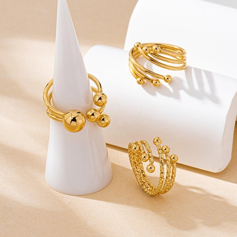 Goldene Legierung Geometrische Ball Offene Ringe Mehrlagiger Strukturierter Fingerschmuck Accessoire Für Frauen Stilvoll