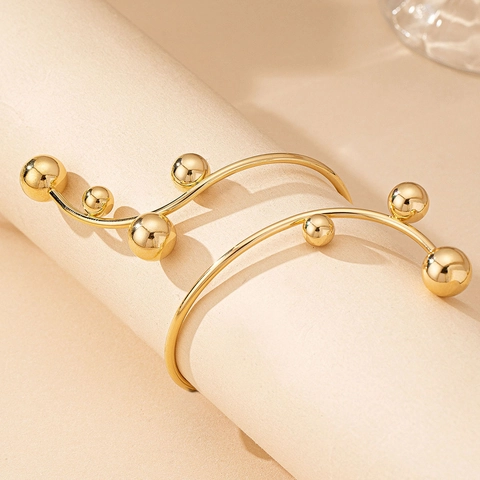 Armreif Aus Eisen Mit Polierten Perlen Spirale Streamline Design Mode Goldener Schmuck