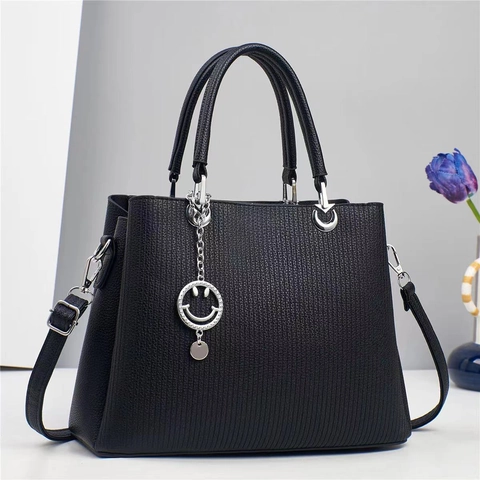 Damen Handtasche PU Leder Gestreifte Textur Schulter Umhängetasche Mit Smiley Anhänger Elegante Büro Große Kapazität Dame