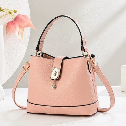 Damen Handtasche Litschi Muster PU Leder Eimer Umhängetasche Bärenschloss Rhinestone Anhänger Griff Lässig Elegant
