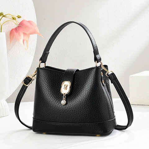 Damen Handtasche Litschi Muster PU Leder Eimer Umhängetasche Bärenschloss Rhinestone Anhänger Griff Lässig Elegant