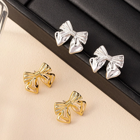 Elegant Bowknot Stud Earrings Zinc Alloy Textured Metallic Ribbon Style Accessory For Women Fashionable
