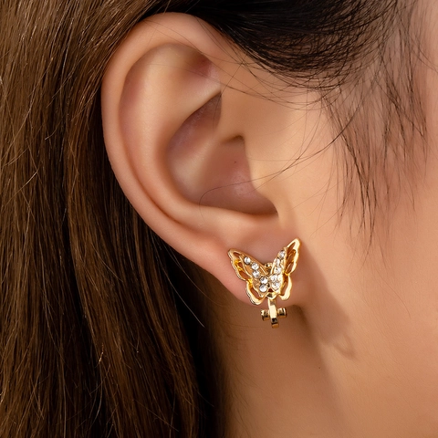 Pendientes De Clip Mariposa Aleación Brillantes Hueco Color Oro Joyería De Moda Para Mujeres Orejas No Perforadas