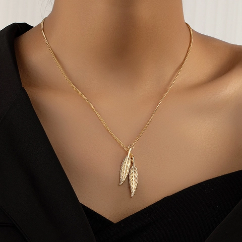 Collana Minimalista In Lega Placcata Oro Con Ciondoli A Doppia Piuma Foglia Strutturata Forma Y Elegante Da Donna