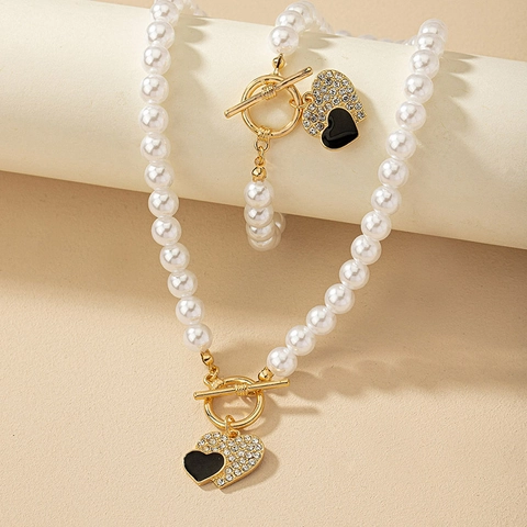 Elegante Collana E Bracciale In Imitazione Perla Artificial Pendente A Cuore Lega Strass Smalto Fibbia OT Dorata Moda Per Donne