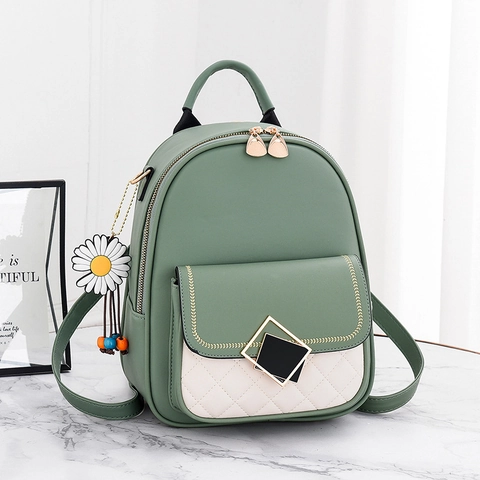Mochila De Moda Para Mujer De Cuero PU Acolchado Color En Contraste Mini Bolso De Viaje Con Colgante De Margarita