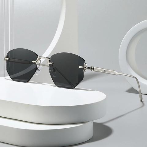 Polygoon Randloze Zonnebril Metalen Frame UV400 Bescherming Harslens Zeskant Gesneden Lens Mode Voor Vrouwen Mannen