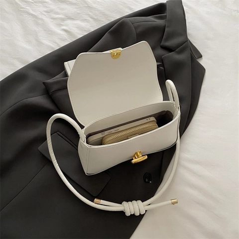Damen Minimalistische PU Leder Unterachseltasche Geknoteter Schultergurt Elegante Klapptasche Mit Goldverschluss Koreanischer Stil