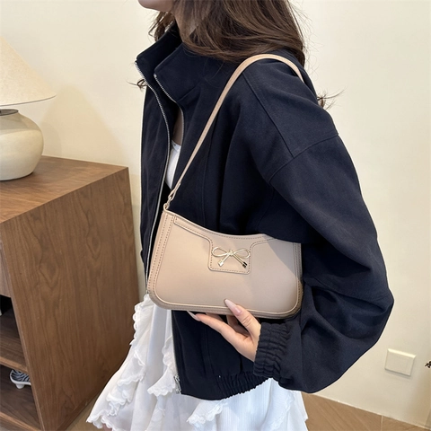 Bolso de Axila con Lazo a la Moda para Mujer Cuero PU Color Sólido Baguette con Decoración de Metal Dorado Bolso Coreano