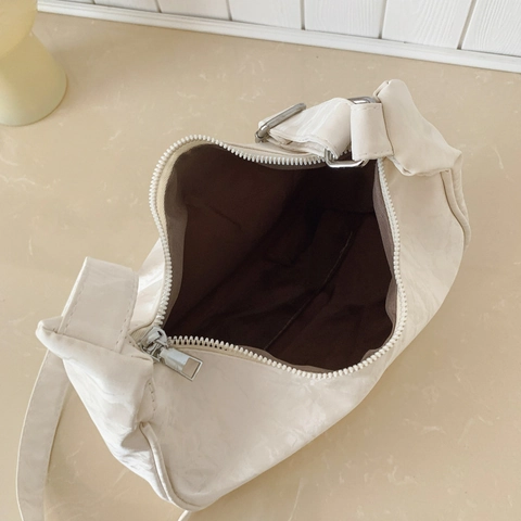 Pleated Dumpling Crossbody Bag PU Leather Ruched Crescent Shoulder Handbag With Adjustable Strap And Plush Charm For Women