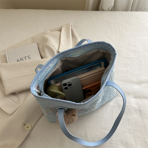Women Textured PU Leather Tote Bag Wave Embroidery Large Capacity Commute Handbag With Cute Plush Bear Charm Accessory