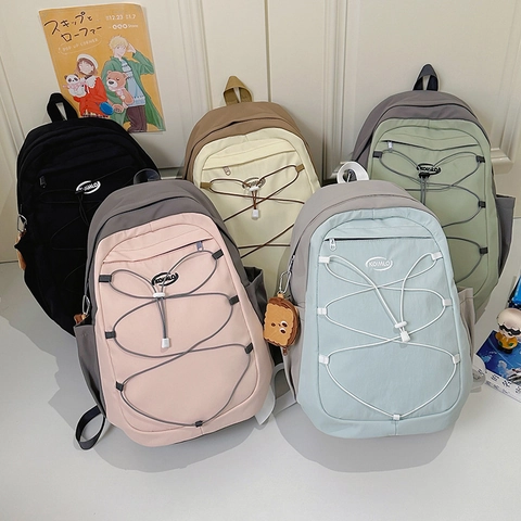 Sac À Dos Décontracté En Nylon Grande Capacité Léger Pour Étudiants Style Urbain Avec Pendentif En Peluche Mignon
