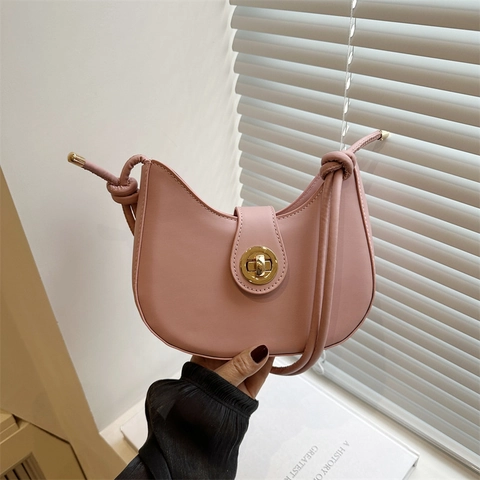 Sac à Épaule Minimaliste en Cuir PU Forme Croissant Pour Femme Nouveau Printemps Sac Bandoulière Versatile Léger Avec Fermoir Tournant Et Détail de Nœud