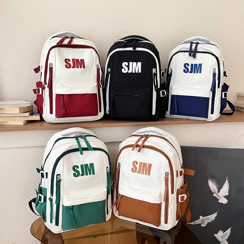 Mochila De Moda Color En Contraste Nylon Impermeable Gran Capacidad Escolar Con Estampado De Letras SJM Para Estudiantes