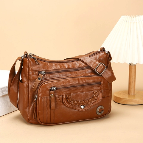 Vintage Dames Zacht PU Leer Multi Pocket Crossbody Tas Grote Capaciteit Schoudertas Met Verstelbare Riem Geweven Detail