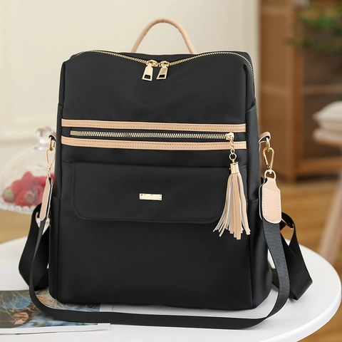 Damen Mode Rucksack Wasserdichtes Oxford Tuch Diebstahlschutz Große Kapazität Quaste Lässig Reisen Multifunktionale Tasche