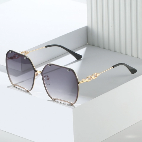 Lunettes De Soleil Géométriques Surdimensionnées Sans Monture En Métal UV400 Rivet Chaîne Branche Mode Femmes