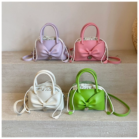 Sac À Épaule À Nœud Papillon Mode Sac À Main En Cuir PU Sac Bandoulière Pendentif Cœur Cordon Intérieur Élégant Style Doux Femmes