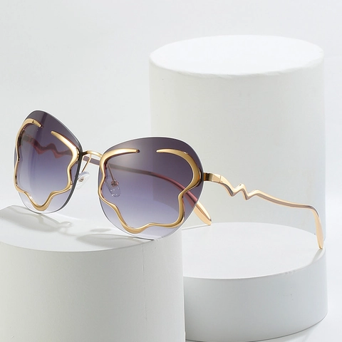 Occhiali Da Sole Senza Montatura A Onde Protezione UV400 Montatura In Lega Di Metallo Lenti Sfumate Moda Da Donna