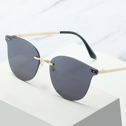 Randloze Cat Eye Zonnebril UV400 Bescherming Metalen Pootjes Mode Lichtgewicht Brillen Voor Dames Heren