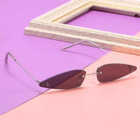 Rimless Cat Eye Sunglasses Triangular Metal Frame UV400 Protection Vintage Jelly Color Fashionable For Women
