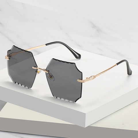 Rimless Hexagonal Sunglasses For Women Metal Temples Wave Cut Lens UV400 Protection Gradient Fashion Eyewear