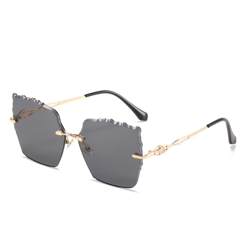 Lunettes De Soleil Sans Monture Femmes Cadre Métal Bords Ondulés Verres Dégradés PC Protection UV400 Mode