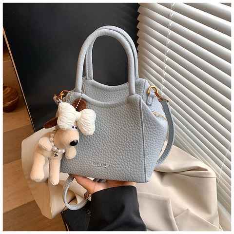 Petit Sac À Main Mignon En Cuir PU Motif Litchi Sac À Bandoulière Avec Pendentif Chien En Peluche Mode Femme