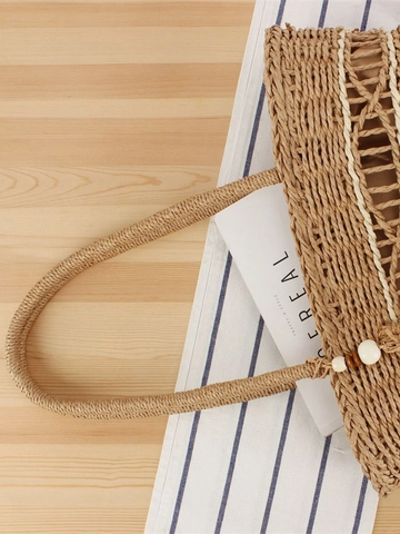 Handgefertigte Stroh Gewebte Tragetasche Papierseil Hohles Design Große Kapazität Strandurlaub Schultertasche Mit Quaste Für Damen