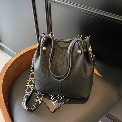 Mode PU Leder Lychee Muster Eimer Tasche Mit Breitem Geometrischem Riemen Große Kapazität Umhängetasche Für Damen