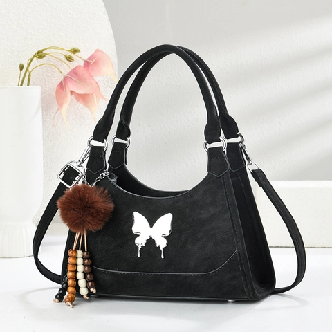 Sac À Épaule Femme Cuir PU Texture Daim Sac À Main Décor Papillon Charme Boule De Fourrure Rétro Style Boston Bandoulière