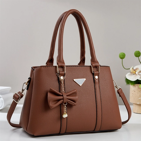Bolso Espacioso Patrón Litchi Cuero PU Bolso De Mano Bolso De Hombro Con Lazo Perla Artificial Elegante Mujeres