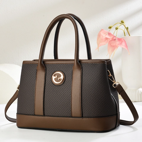 Bolso Tote Para Mujer Cuero PU Patchwork Tejido Bolso De Mano Gran Capacidad Conmuta Bolso De Hombro Elegante Logo Metálico