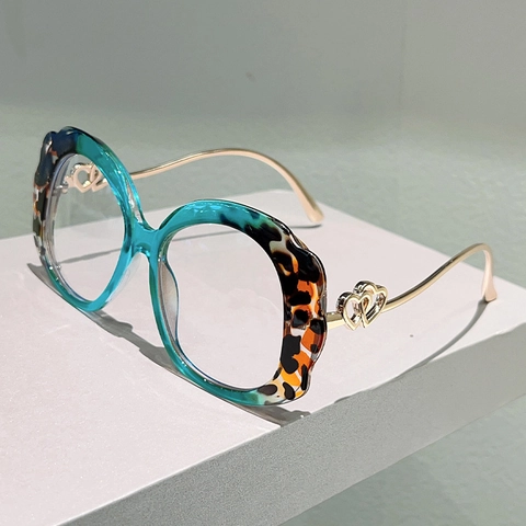 Occhiali Anti Luce Blu Montatura Tonda Ondulata Stampa Leopardata Aste Metallo Cuore PC Moda Donne
