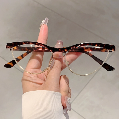 Occhiali Anti Luce Blu Cat Eye Donna Retro Mezza Montura Metallo PC Lenti Trasparenti Moda Vintage