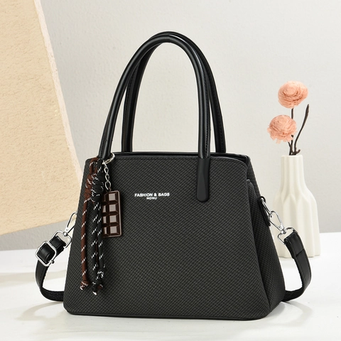 Elegante Handtasche Damen PU Leder Gewebte Textur Umhängetasche Große Kapazität Mit Schokoladenanhänger