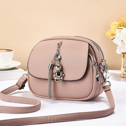 Women Crossbody Bag Lychee Texture PU Leather Multiple Zipper Compartments Bear Pendant Metal Tassel Adjustable Strap
