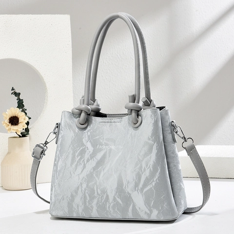Damen PU Leder Eimer Handtasche Mode Buchstabenknoten Griff Marmortextur Umhängetasche Minimalistisch