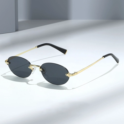 Gafas De Sol Ovaladas Sin Montura Retro Marco De Metal Lente AC Protección UV400 Ligeras Vintage Para Mujeres Hombres Moda