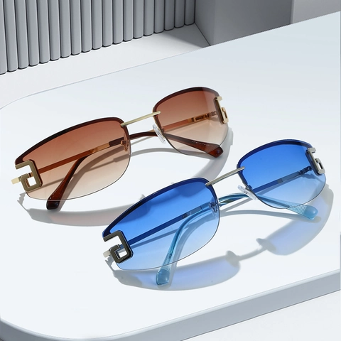 Occhiali Da Sole Senza Montatura Protezione UV400 Stanghette In Metallo Lenti Graduate Moda Retro Esterni Per Uomini E Donne