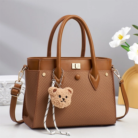 Women Vintage PU Leather Woven Patchwork Handbag Large Capacity Tote With Metal Twist Lock And Plush Bear Charm