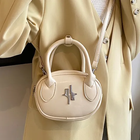 Mini Oval Handbag PU Leather Crossbody Bag For Women With Metallic Star Decor Chic Niche Small Shoulder Purse Versatile